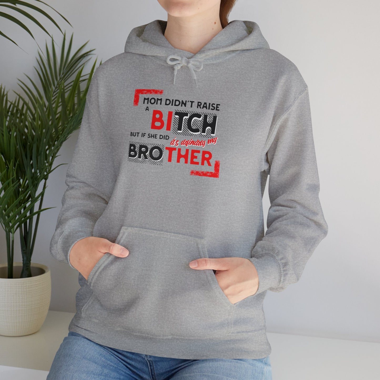 Mom Didn't Raise A Bitch Unisex Heavy Blend™ Hooded Sweatshirt